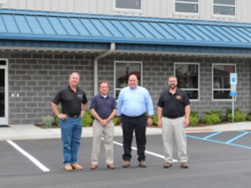 4 men standing for a photo